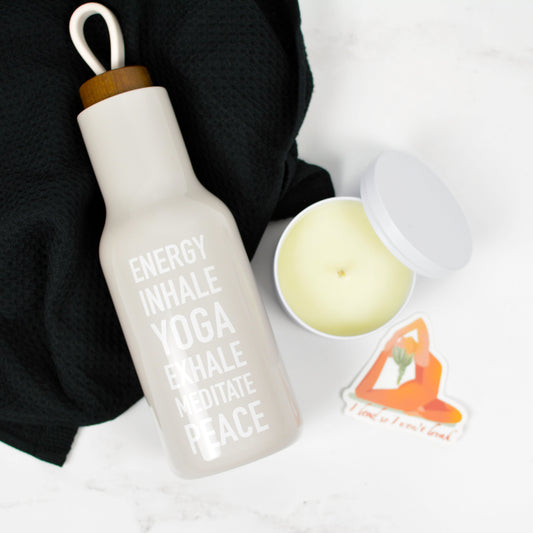 yoga themed wellness gift box with water bottle and candle