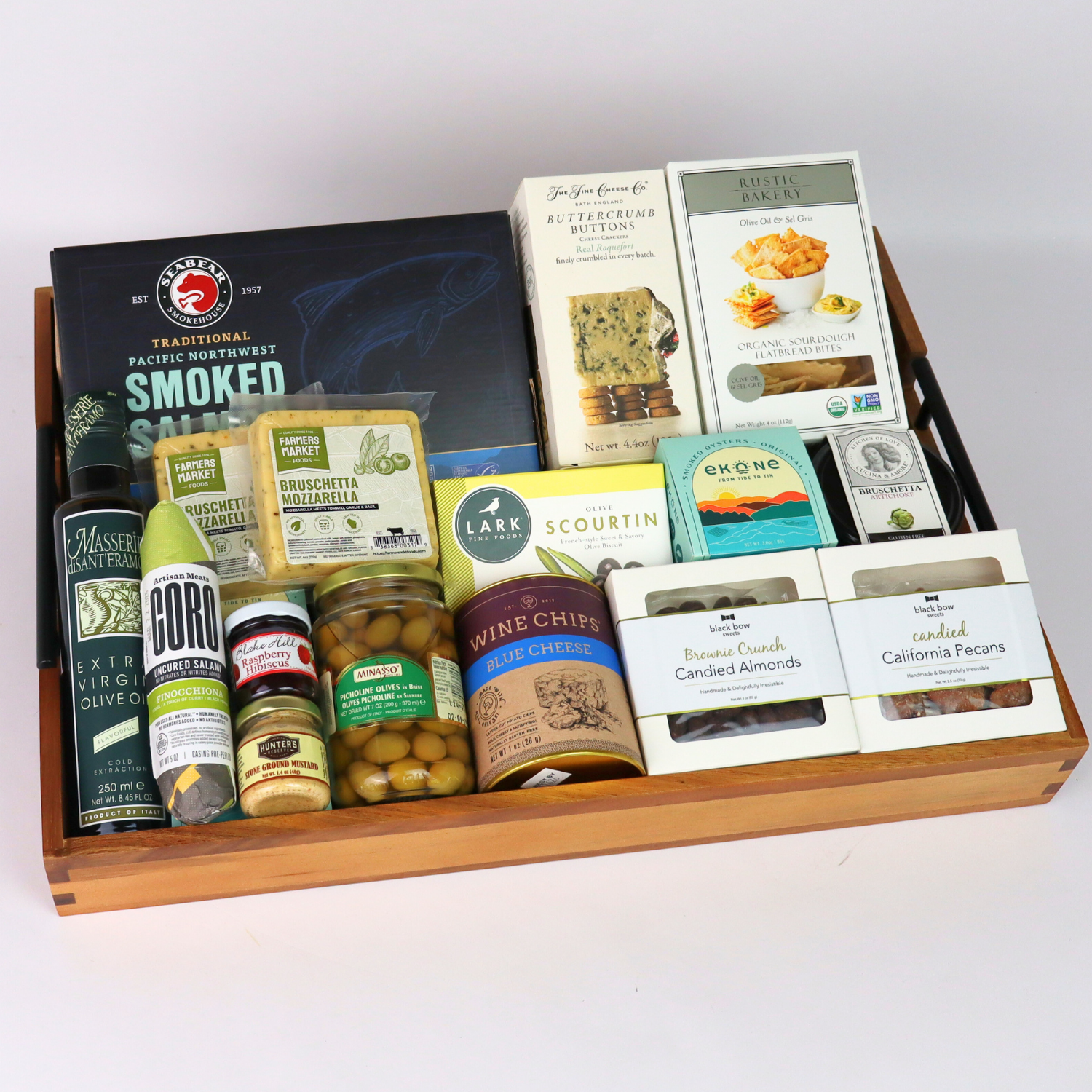 wooden tray gift set featuring smoked salmon, artisan crackers, sweets, and savory snacks – gourmet gift basket.
