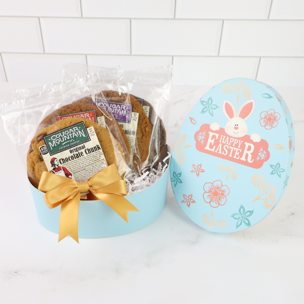 Baked goods in a decorative Easter basket with a 'Happy Easter' card on a tiled background