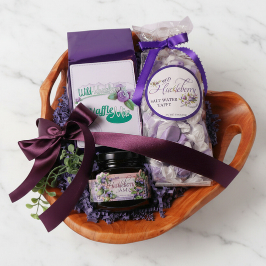 Gift basket with Wild Huckleberry products on a marble surface
