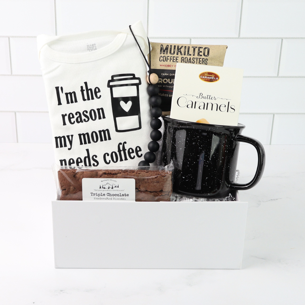Gift set with t-shirt, mug, coffee beans, and cookies on a white background