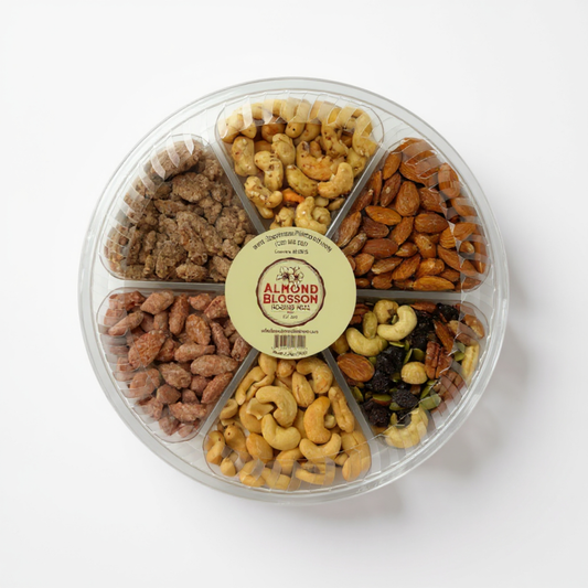Assorted gourmet nut tray with red ribbon, perfect client appreciation or office snack gift.