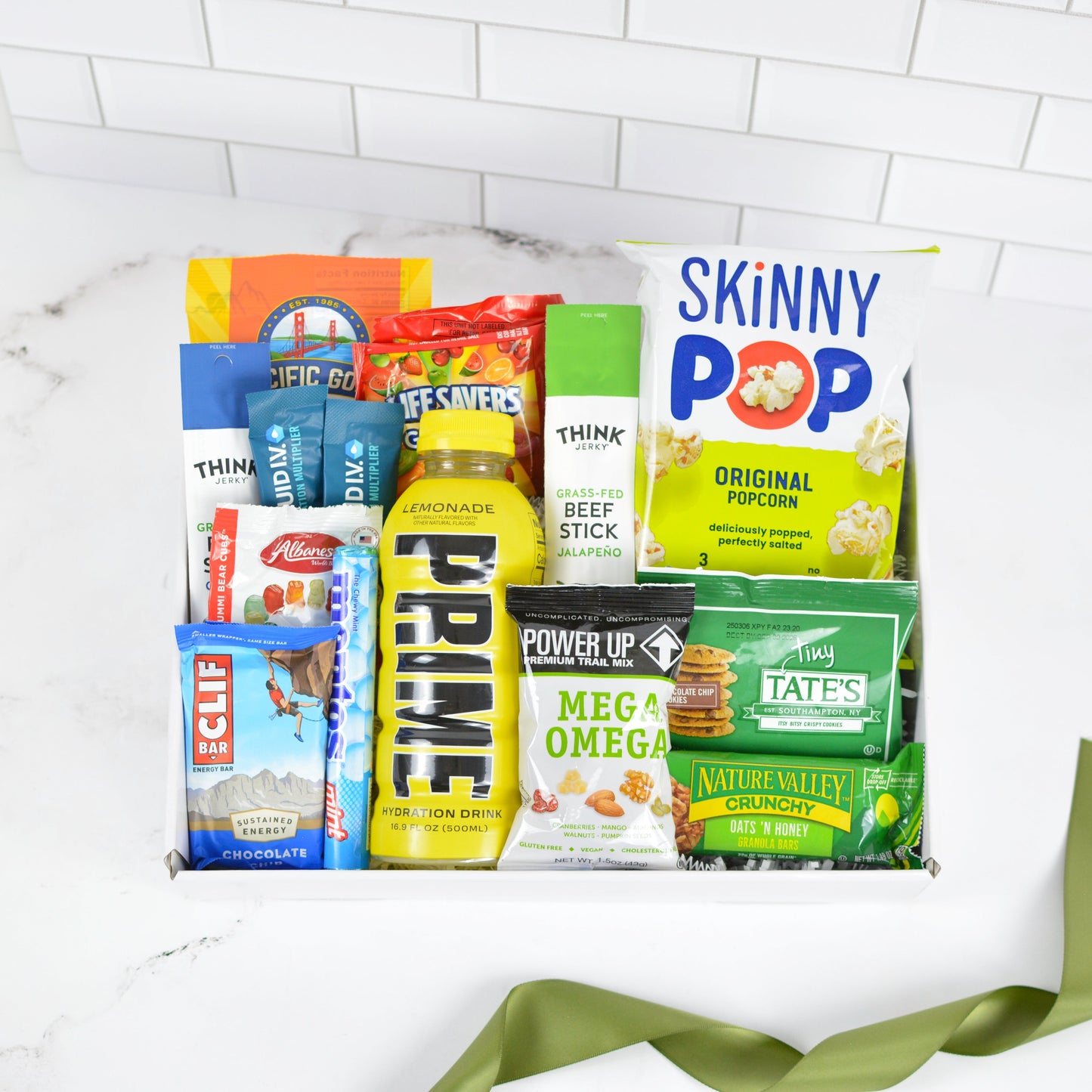 snack gift basket with popcorn granola bars and candy