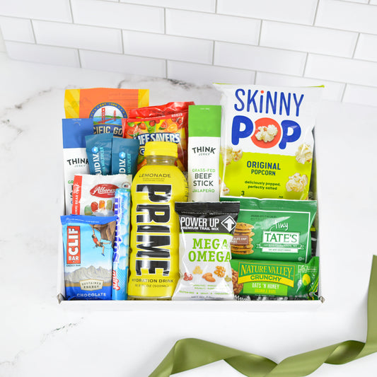 snack gift basket with popcorn granola bars and candy